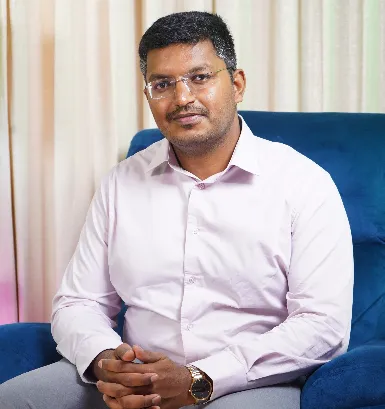 Dr. Mohan Suresh